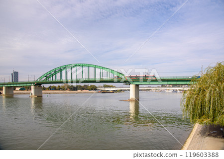 Old Sava Bridge, crossing the river Sava and used for car and tram traffic in Belgrade, capital of Serbia 119603388