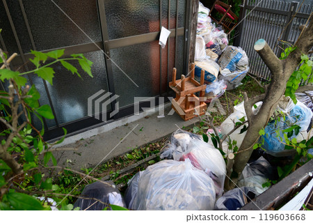 Garbage bags outside a house Garbage bags outside a house 119603668