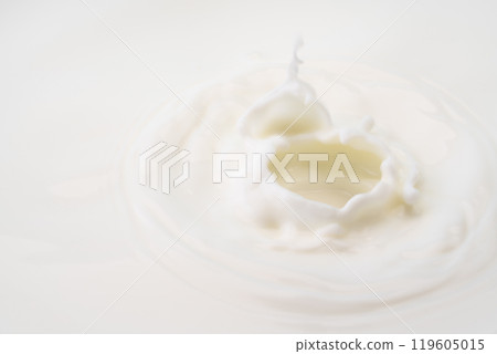 Close-up of rippling milk surface 119605015