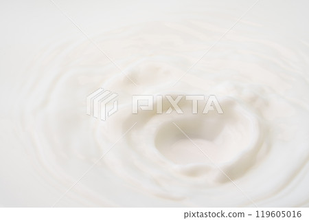 Close-up of rippling milk surface 119605016