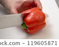 Put a knife into the paprika 119605871