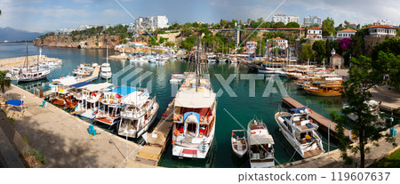 Panorama of the Antalya Old Town port with tourist ships 119607637