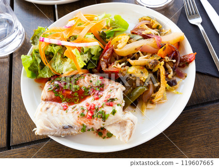 French-style molva or sea pike with vegetables.  119607665