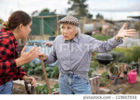 Conflict between female neighbors in country farm 119607838