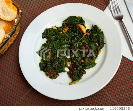 Traditional regional Spanish dish is spinach in Catalan 119608236