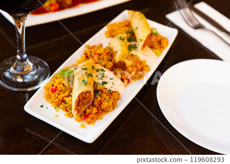 Delicious spring roll from Moroccan, harissa and couscous Delicious spring roll from Moroccan, harissa and couscous 119608293