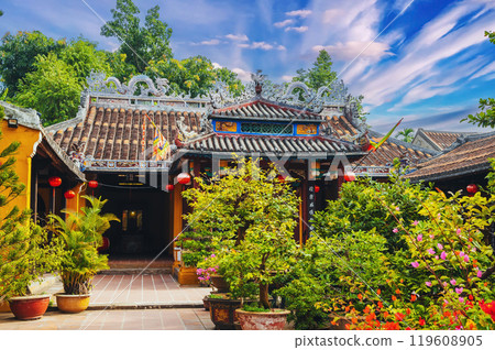 Asian Buddhist temple on Vietnamese pagoda in the old town in Hoi An in Vietnam in Asia at sunset in summer 119608905