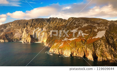 A Beautiful Coastal Landscape Featuring Rocks and Glimmering Water, Capturing Natures Splendor 119609644