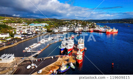 Killybegs harbour at Donegal Ireland - Colorful Fishing Boats Gracefully Situated in the Calm and 119609815