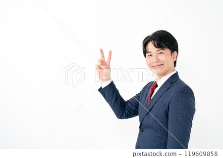 Businessman, male in his 20s, peace sign, step 2 119609858