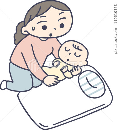 A mother gently puts her sleeping baby to bed 119610528