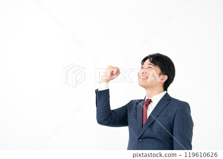 Businessman, male in his 20s, fist pump Businessman, male in his 20s, fist pump 119610626