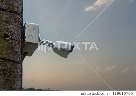 ip cctv camera installed on high pole to do the security by monitoring through mobile phone and computer to save human life and property, soft and selecitve focus. 119610790