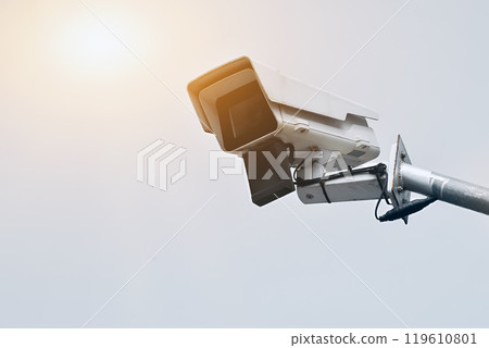 ip cctv camera installed on high pole to do the security by monitoring through mobile phone and computer to save human life and property, soft and selecitve focus. 119610801