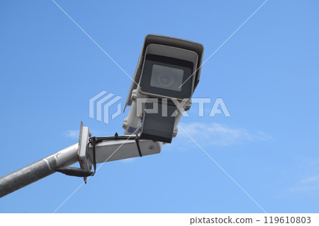 ip cctv camera installed on high pole to do the security by monitoring through mobile phone and computer to save human life and property, soft and selecitve focus. 119610803