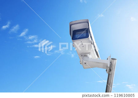 ip cctv camera installed on high pole to do the security by monitoring through mobile phone and computer to save human life and property, soft and selecitve focus. ip cctv camera installed on high pole to do the security by monitoring through mobile phone and computer to save human life and property, soft and selecitve focus. 119610805