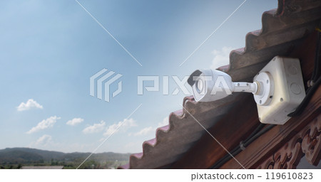 ip cctv camera installed on high pole to do the security by monitoring through mobile phone and computer to save human life and property, soft and selecitve focus. 119610823