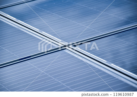 closeup photovoltaic panels which installed on the rooftop of the building, concept for storing and using natural power from the sunlight to care about human environment over the world. 119610987