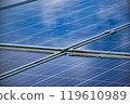 closeup photovoltaic panels which installed on the rooftop of the building, concept for storing and using natural power from the sunlight to care about human environment over the world. 119610989