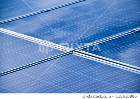 closeup photovoltaic panels which installed on the rooftop of the building, concept for storing and using natural power from the sunlight to care about human environment over the world. 119610990