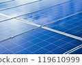 closeup photovoltaic panels which installed on the rooftop of the building, concept for storing and using natural power from the sunlight to care about human environment over the world. 119610999