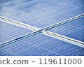 closeup photovoltaic panels which installed on the rooftop of the building, concept for storing and using natural power from the sunlight to care about human environment over the world. 119611000