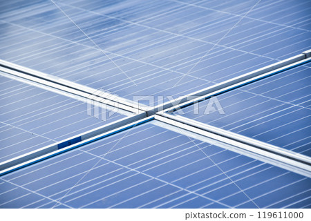 closeup photovoltaic panels which installed on the rooftop of the building, concept for storing and using natural power from the sunlight to care about human environment over the world. closeup photovoltaic panels which installed on the rooftop of the building, concept for storing and using natural power from the sunlight to care about human environment over the world. 119611000