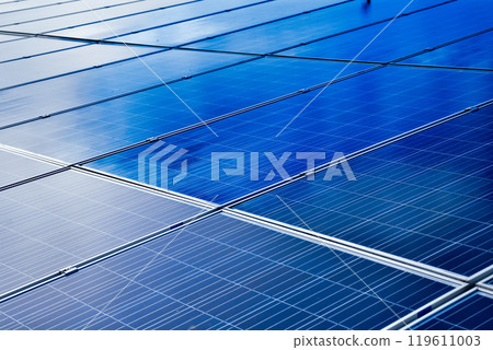 closeup photovoltaic panels which installed on the rooftop of the building, concept for storing and using natural power from the sunlight to care about human environment over the world. closeup photovoltaic panels which installed on the rooftop of the building, concept for storing and using natural power from the sunlight to care about human environment over the world. 119611003