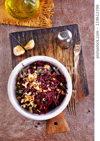 beetroot salad with roasted hazelnuts 119612398