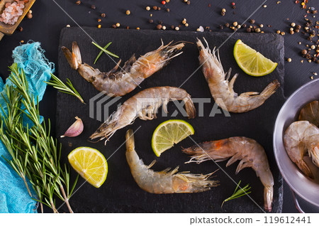 fresh tiger Prawns, shrimp seafood with lemon and spices. fresh tiger Prawns, shrimp seafood with lemon and spices. 119612441