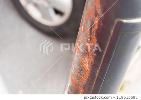 Damaged parking lot pillar 119613693