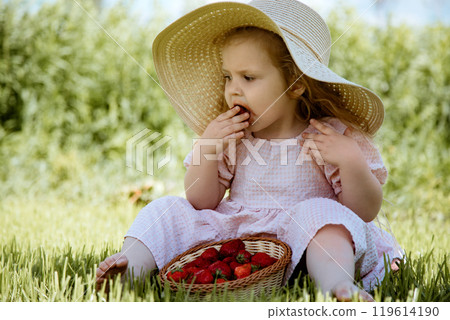 Delightful Moments: Child Enjoying Strawberries on Delightful Moments: Child Enjoying Strawberries on 119614190