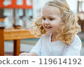 A Playful Child Happily Enjoying Various Outdoor 119614192
