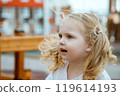 A Playful Child Happily Enjoying Various Outdoor 119614193