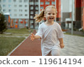 A Playful Child Happily Enjoying Various Outdoor 119614194