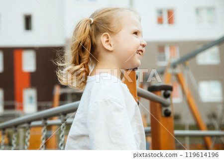A Playful Child Happily Enjoying Various Outdoor 119614196