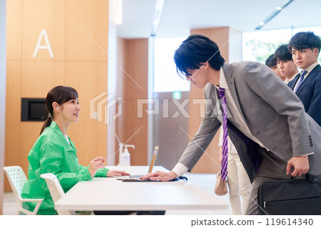 Conference reception staff and participants 119614340