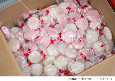 Red and white mochi packed in bags for mochi-maki Red and white mochi packed in bags for mochi-maki 119614394