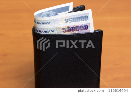 Old Turkish Lira in the black wallet 119614494