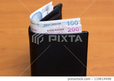 Turkish Lira in the black wallet Turkish Lira in the black wallet 119614496