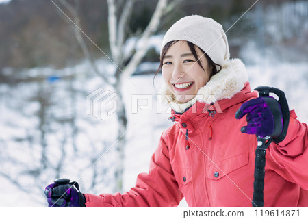 Woman enjoying winter leisure 119614871