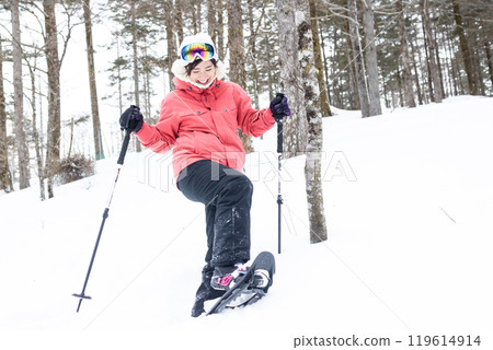 Women enjoying snowshoes Women enjoying snowshoes 119614914
