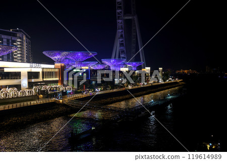 Dubai, United Arab Emirates - September 28, 2024 Night view of the artificial island Bluewaters Island with the unique attraction Eye of Dubai. Editorial Dubai, United Arab Emirates - September 28, 2024 Night view of the artificial island Bluewaters Island with the unique attraction Eye of Dubai. Editorial 119614989