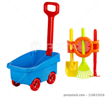 A set of children's toys for playing in the sand with a children's shovel, a car and a rake. the concept of children's recreation in the sandbox or on the beach. isolated on white background 119615016
