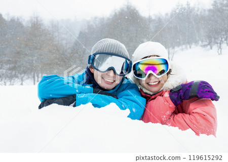 Couple enjoying winter mountain Couple enjoying winter mountain 119615292
