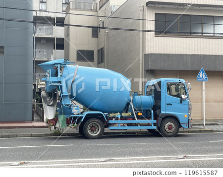 concrete mixer car drives through Japanese streets 119615587