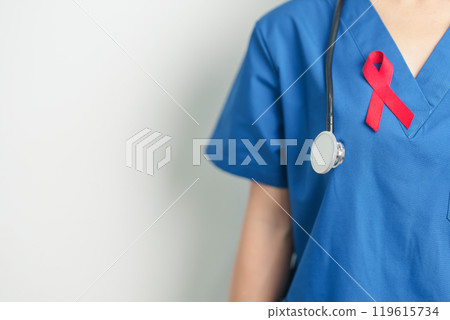 Doctor with Red Ribbon for December World Aids Day, acquired immune deficiency syndrome, multiple myeloma Cancer Awareness month and National Red ribbon week. Healthcare and world cancer day concept Doctor with Red Ribbon for December World Aids Day, acquired immune deficiency syndrome, multiple myeloma Cancer Awareness month and National Red ribbon week. Healthcare and world cancer day concept 119615734