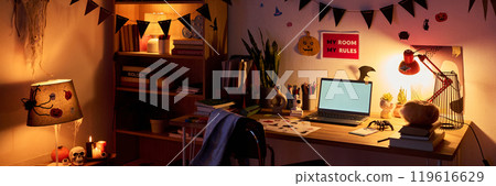 Table with laptop and Halloween symbols Table with laptop and Halloween symbols 119616629
