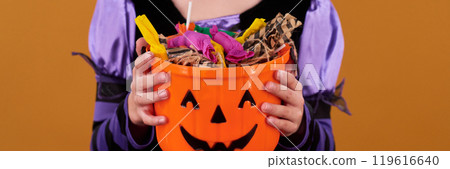 Hands of youthful girl holding treats Hands of youthful girl holding treats 119616640