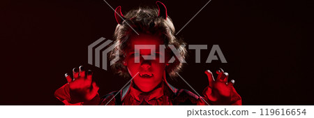 Little vampire with horns and fangs 119616654
